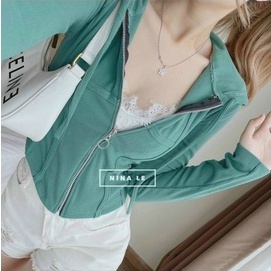 Áo kiểu có nón tay dài viền chỉ gân dây kéo giữa cực xinh , chất thun gân