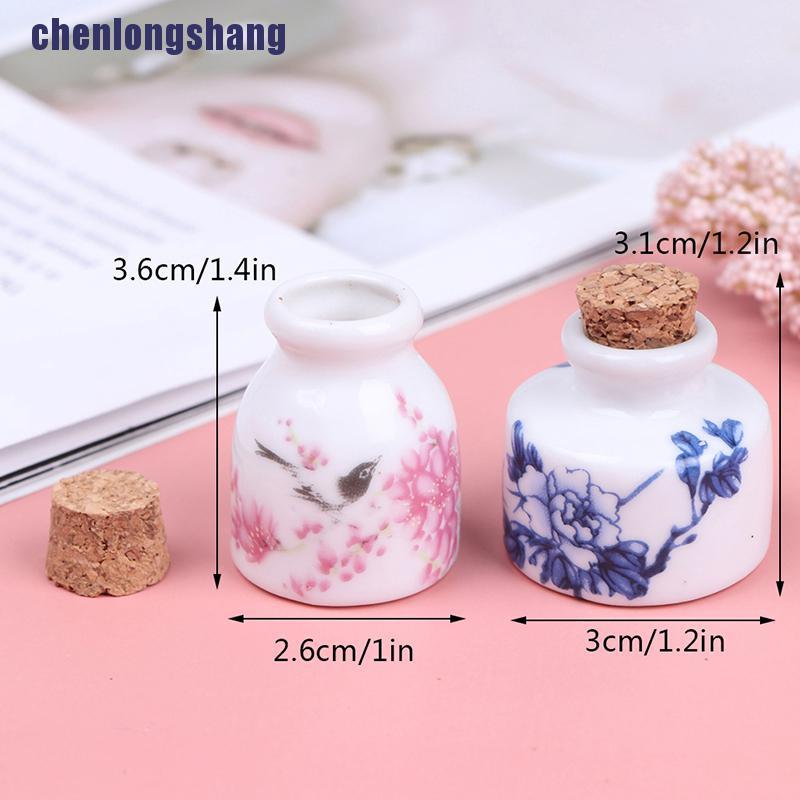 Chai bằng gốm sứ thủy tinh để đựng chất lỏng có nút bần bằng gỗ tiện dụng