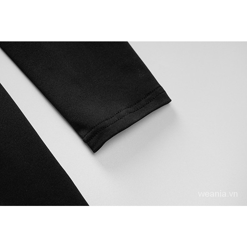 Đầm dự tiệc dài tay cổ cao phối dây thiết kế hở lưng quyến rũ