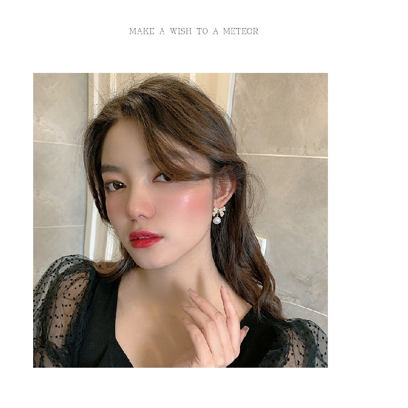 Khuyên tai hình nơ đính ngọc trai kiểu dáng thanh lịch cho nữ