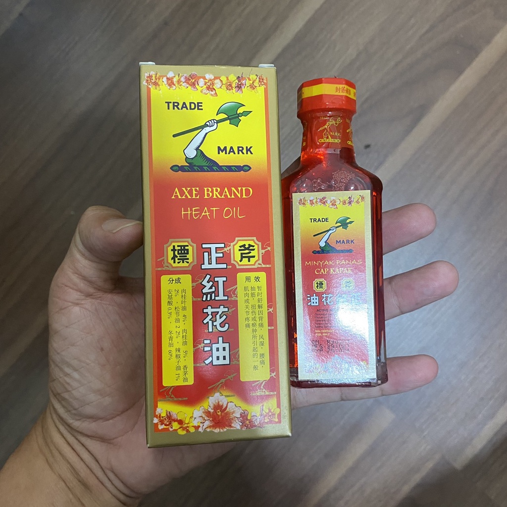 Dầu Nóng Hồng Hoa Hiệu Cây Búa Red Oil Flower 32ml Axe Brand
