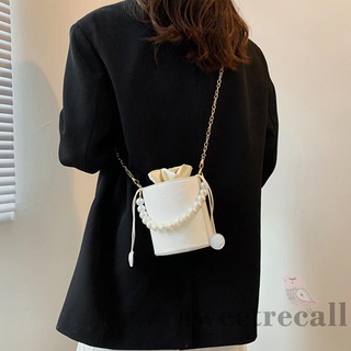 Túi xách có dây ngọc trai đeo vai khóa dây rút họa tiết dập nổi màu trắng phong cách vintage dành cho nữ