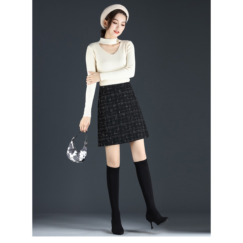 Chân váy ngắn dáng chữ A hot trend Eva design , chất vải dạ tweed màu đen kẻ sọc có quần trong siêu xinh