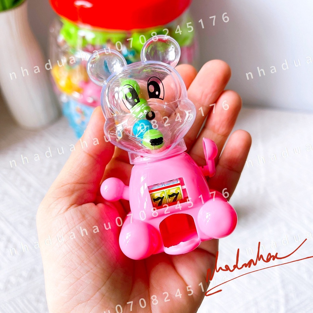Một lốc gồm 20 cái máy bắn kẹo đồ chơi (kèm kẹo) hình gấu dễ thương Hongkong cái 20gam