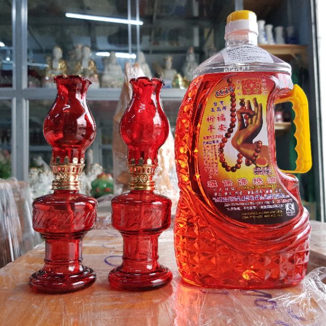 Cặp đèn dầu và chai dầu lưu ly cát tường