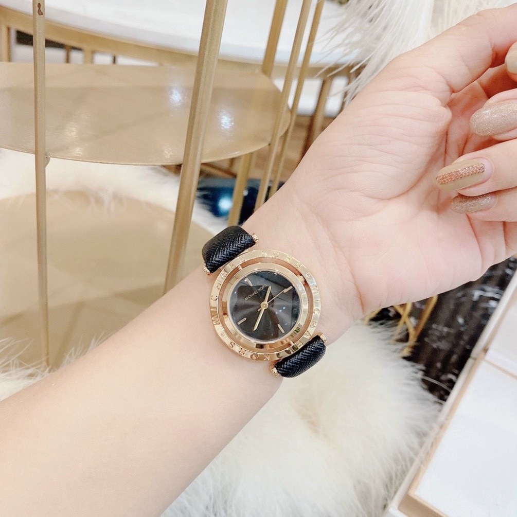 Đồng hồ nữ Michael Kors Dây da mặt xoay độc đáo