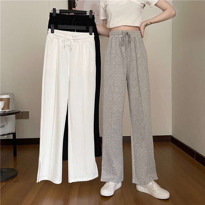 Quần dài dáng rộng lưng cao với thiết kế xẻ tà phối dây rút thời trang cá tính