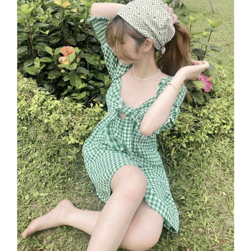 Váy kẻ xanh nơ ngực tay bồng trể trung