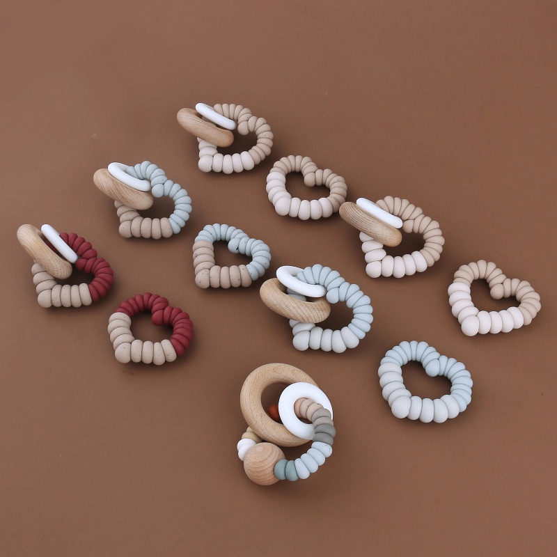 Đồ Chơi Vòng Tay Ngậm Mọc Răng Bằng Silicone Dành Cho Bé Sơ Sinh