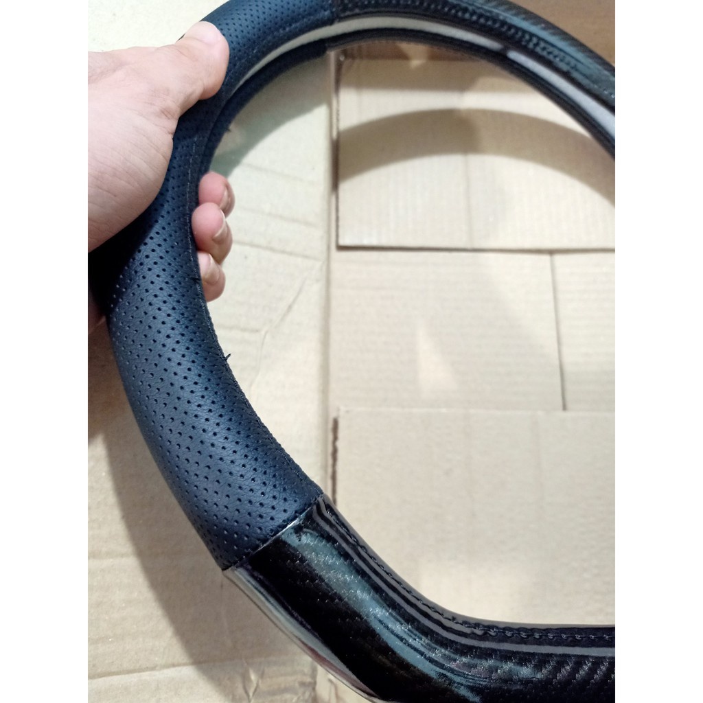 Bọc vô lăng ô tô kiểu dáng dcut cho xe kia seltos, xl7, k5, VFE34, VF8 etriga, sonet,almera, kick, territory, custin