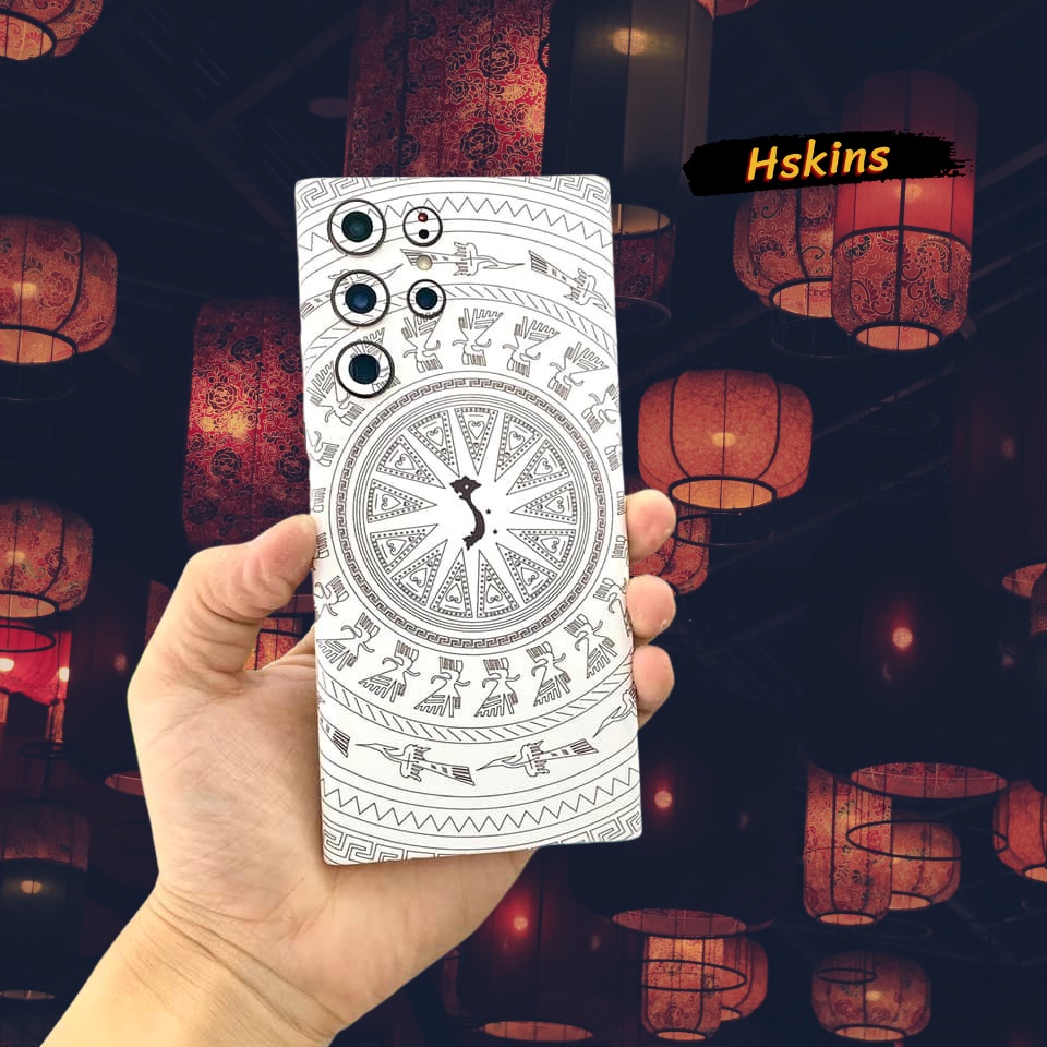 Miếng dán Skin trống đồng iPhone 14 Pro Max / 13 Pro Max / 12 Pro Max / 11 Pro Max / Xs Max / 8 Plus in UV cao cấp