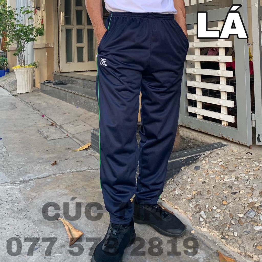 QUẦN THỂ THAO DÀI, 1 SỌC, CÓ 2 TÚI KHÓA KÉO. CÚC TIN.