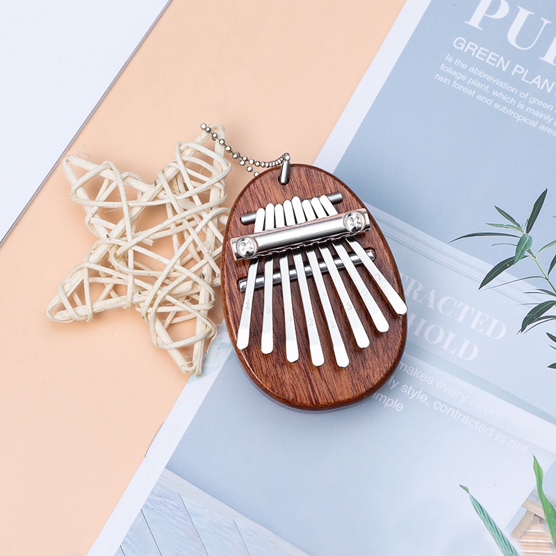 Đàn kalimba 8 Phím mini Màu Trong Suốt Dùng Trang Trí