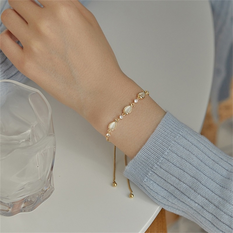 Vòng tay mặt hình cá nhỏ đính đá Opal có thể điều chỉnh cho nữ