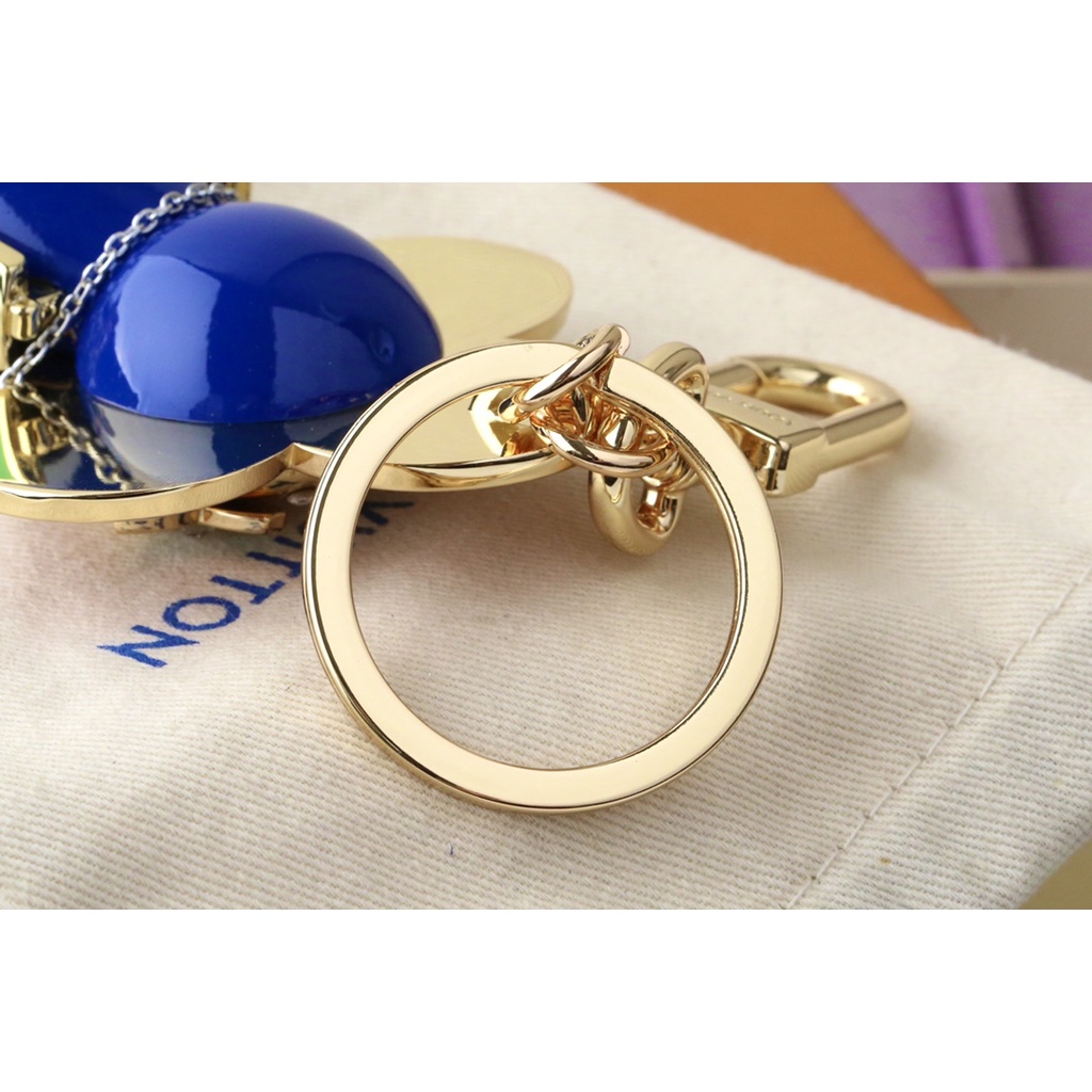 Móc Khóa Hình Hoa Hướng Dương LV Màu Vàng Tương Phản