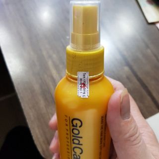 Xịt dưỡng tóc Gold Care