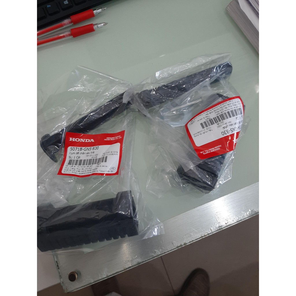 Cụm để chân sau phải trái dream 100 chính hiệu honda