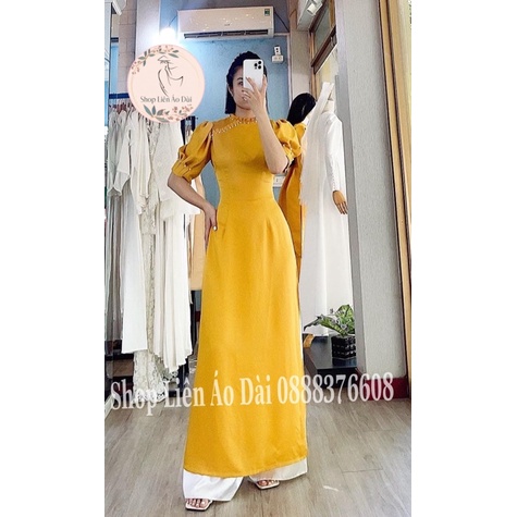 Áo dài cách tân nữ cổ xếp ly tay ngắn bo tay, áo dài thiết kế xếp ly kiểu cách trên phần thân trẻ, áo dài may sẵn