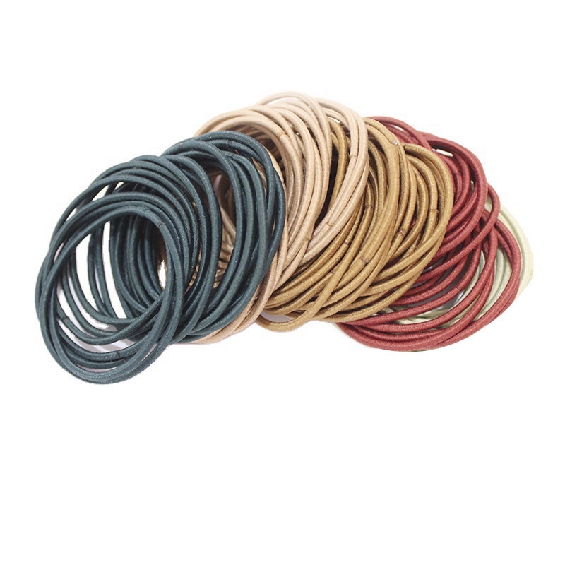 Hộp 100 dây buộc tóc đơn giản dành cho nữ