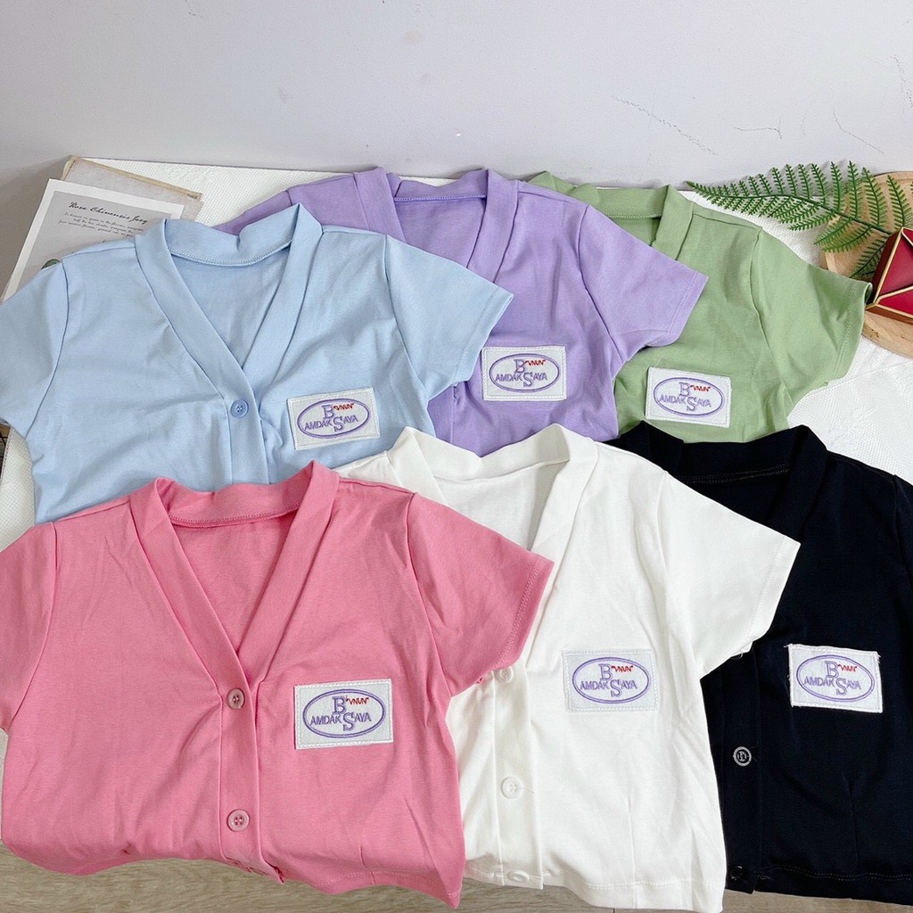 áo croptop cô tim cài nút thêu logo xinh