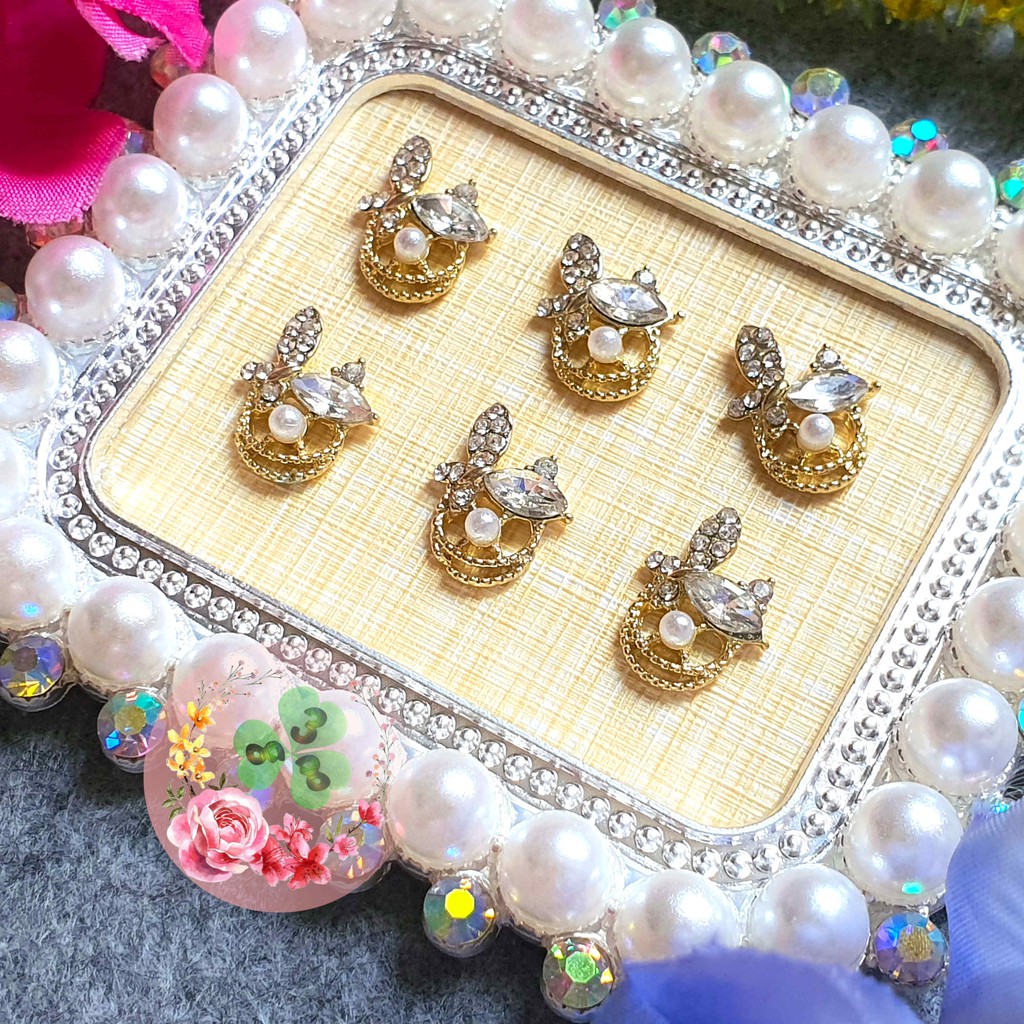 Mã CR045 - CR154 . Charm kim loại đính đá trang trí móng siêu xinh.