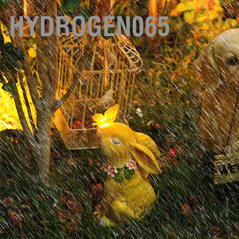 Tượng vườn năng lượng mặt trời Thỏ với bướm sạc Vẽ tay bằng nhựa tổng hợp Đèn 12*14*24cm Hydrogen065