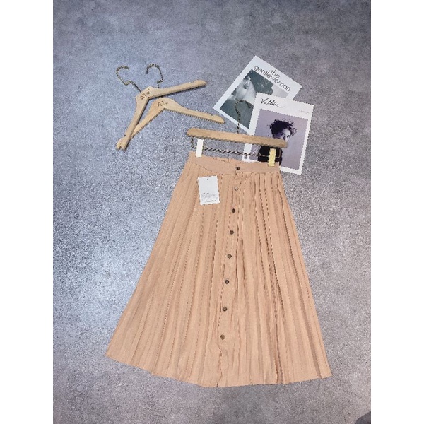 CHÂN VÁY MIDI BE KHUY GỖ