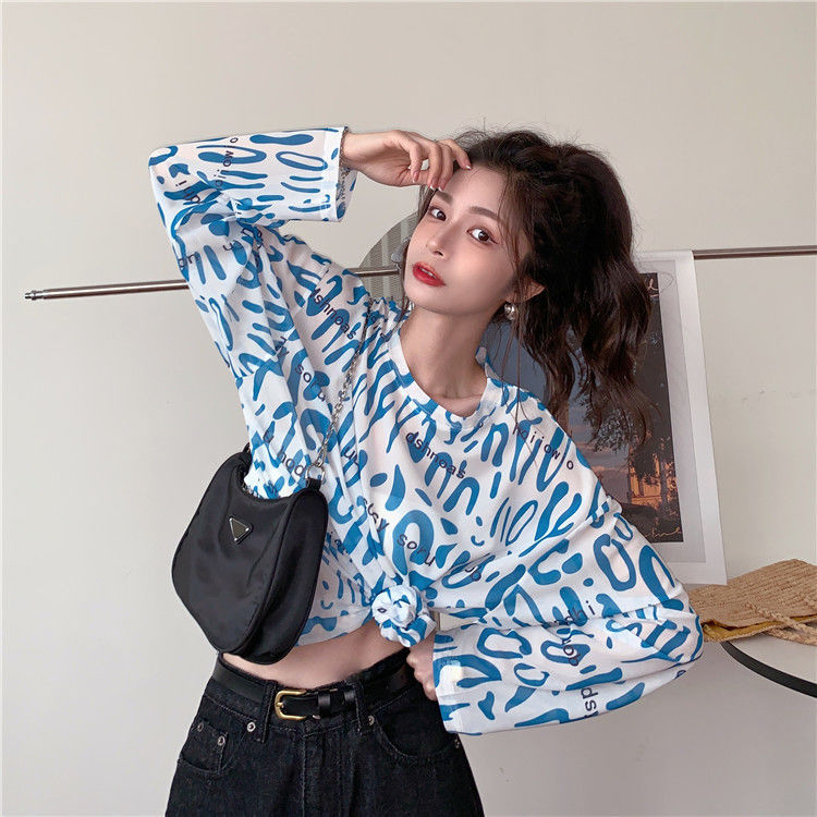 Áo thun tay dài dáng rộng họa tiết da báo cá tính cho nữ