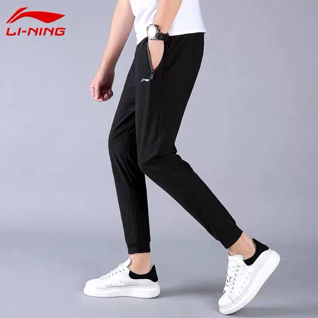 Quần gió lining nam sale