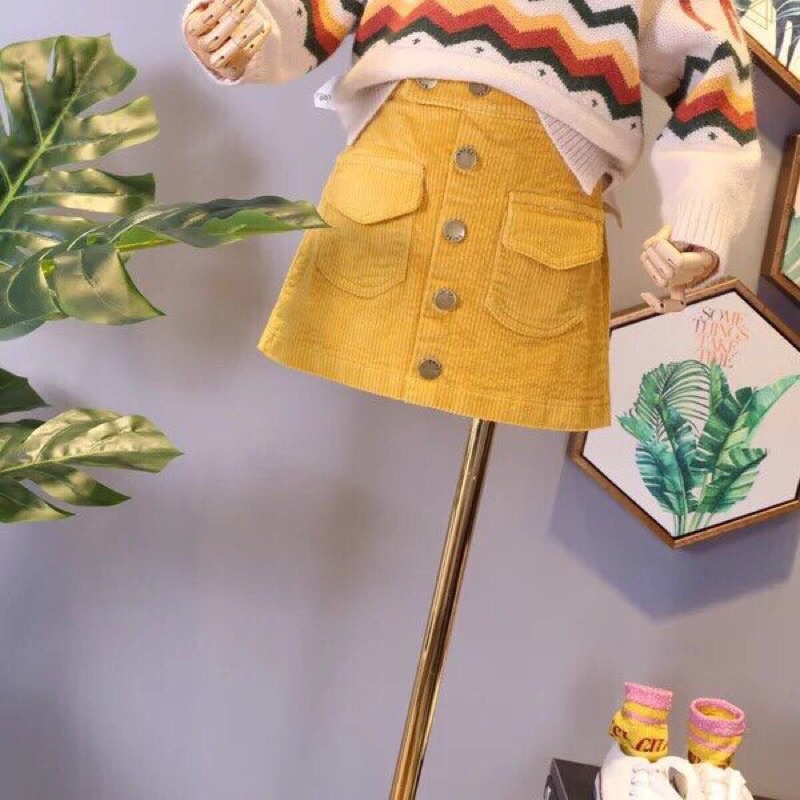 Chân váy nhung tăm dáng chữ A cúc dọc màu vàng cực tây size 14-30kg