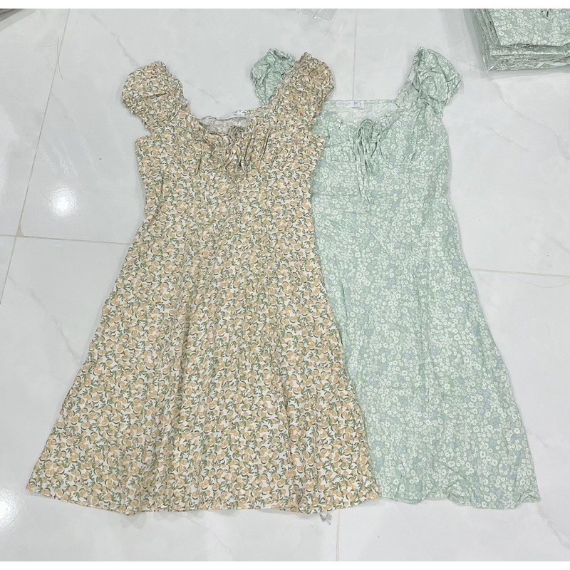 Đầm hoa nhí tay nhún xuất dư xịn