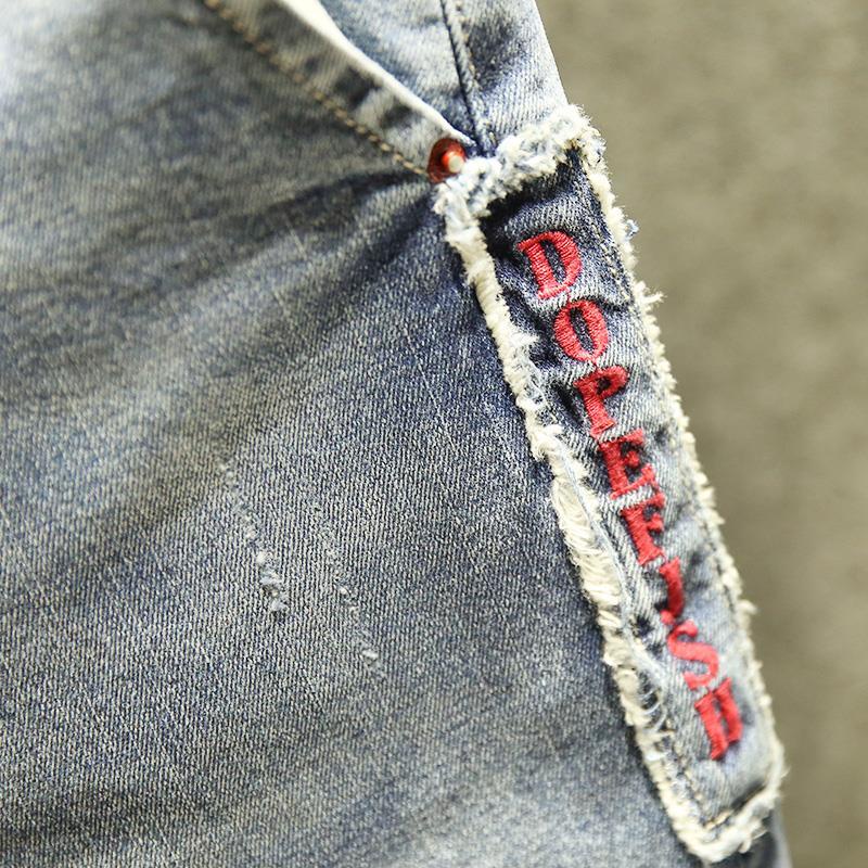 Quần jean dài giặt kỹ in logo co giãn màu sáng thời trang cá tính nổi bật cho nam