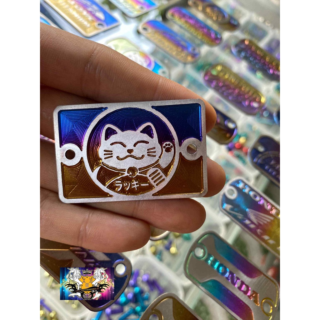 LOGO TITAN GẮN NẮP BÌNH DẦU TAY THẮNG XE WAVE , HD, SIRUS, YAMAHA , VARIO, SONIC, WINER, EX