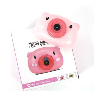Máy ảnh heo hồng thổi bong bóng