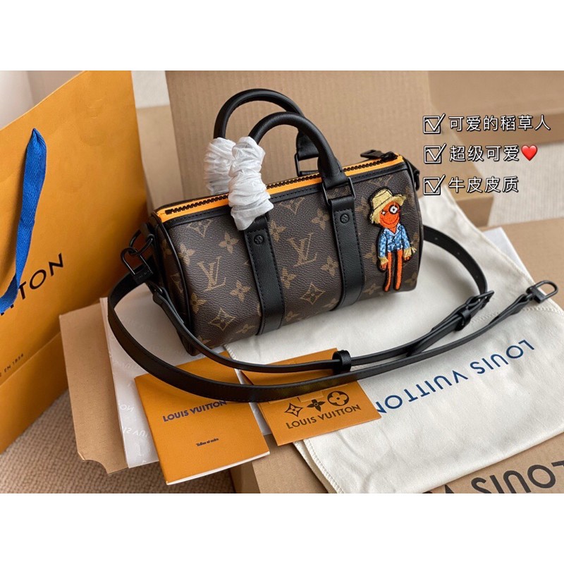 túi xách tay có dây đeo cho cả nam và nữ dáng trống thêu hình logo khoá kéo louis vuitton LV