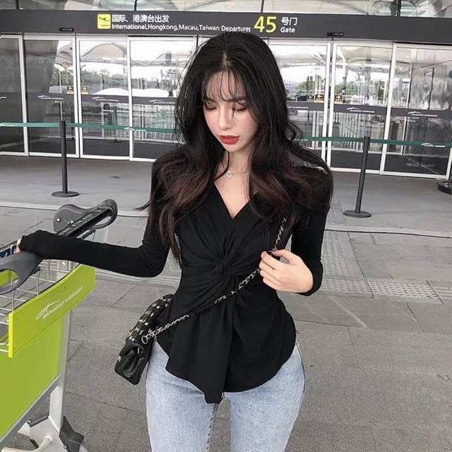 Áo len xoắn eo