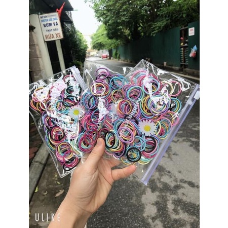 Gói 200 dây chun buôc tóc hoa cúc túi zip