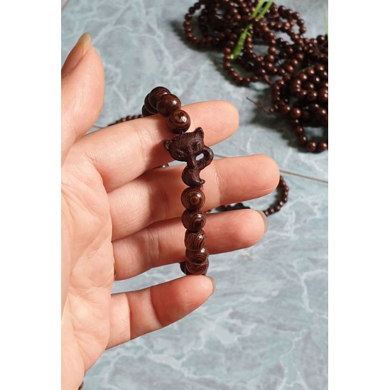 Vòng tay gỗ mun đuôi công  míc hồ ly