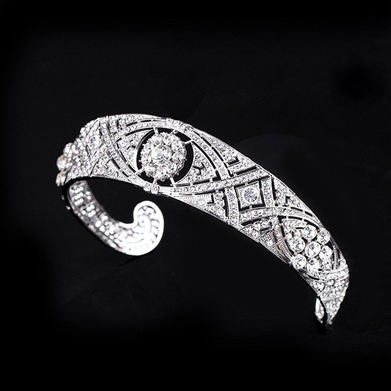 The bride's crown is studded with crystal stones