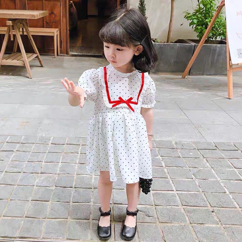Đầm bé gái chấm bi phối ren nơ 9-20kg