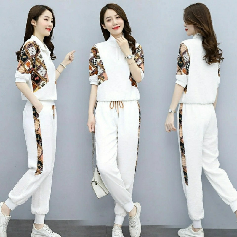 Bộ đồ 2 món áo thun tay ngắn cổ polo + quần dài phối dây rút thiết kế in họa tiết thời trang cho nữ