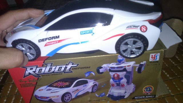 Xe chạy PIN biến thành Robot có nhạc và đèn Led rất đẹp (tặng kèm PIN)