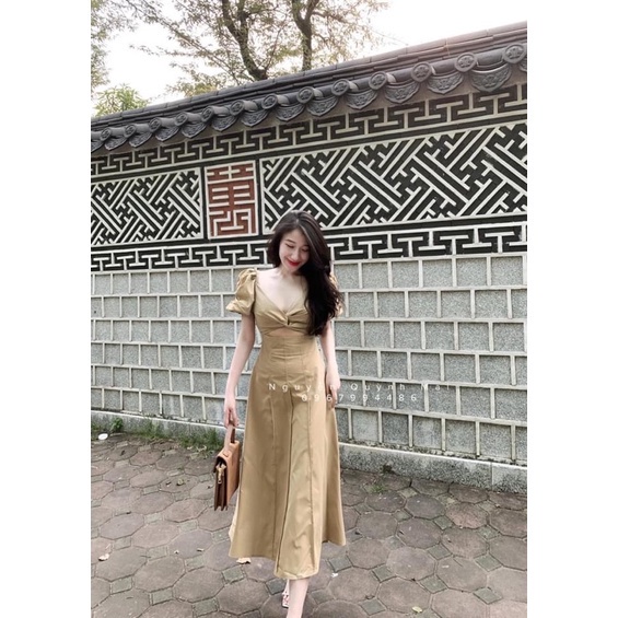 Váy xoắn ngực li dọc tay bồng hot hit