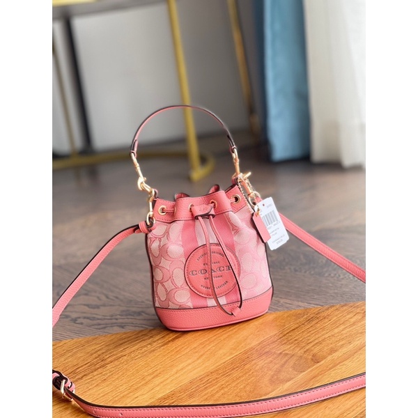 HÀNG XUÂT DƯ XỊN_Túi Coach bucket sang xịn trẻ trung 3 màu, da thật phối canvas check code được