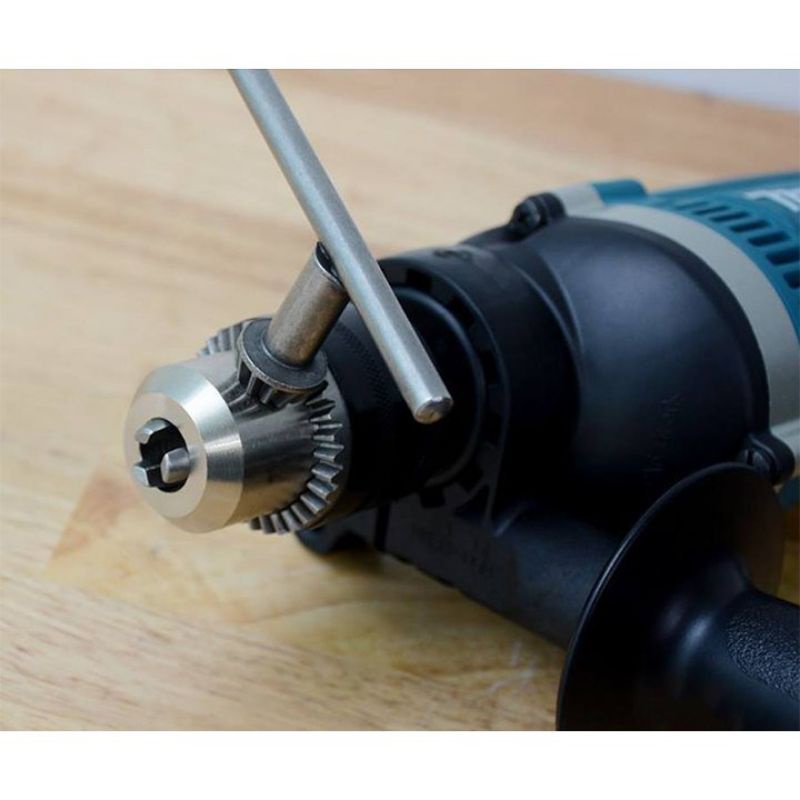máy khoan bê tông,khoan sắt Makita PH 1630 công suất 710w mô tơ 100%dây đồng