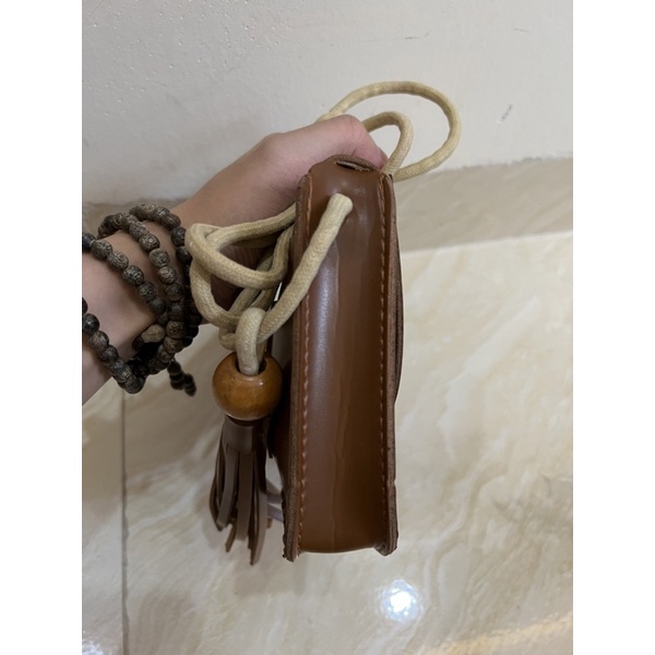 Túi si lạ màu nâu