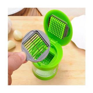 Dụng cụ dập tỏi ớt
