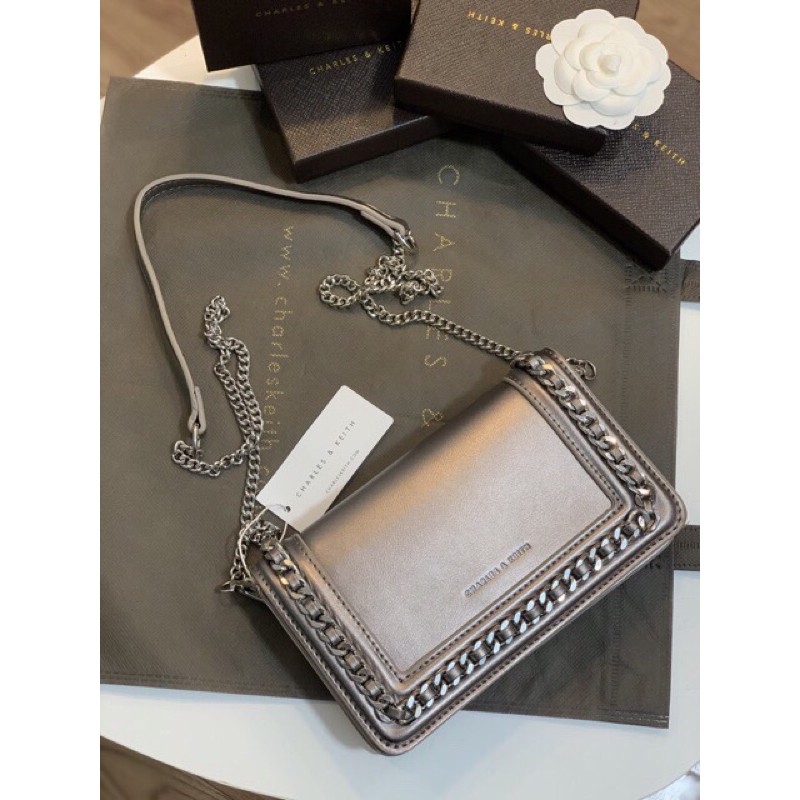 Túi ckk viền xích bạc xuất dư