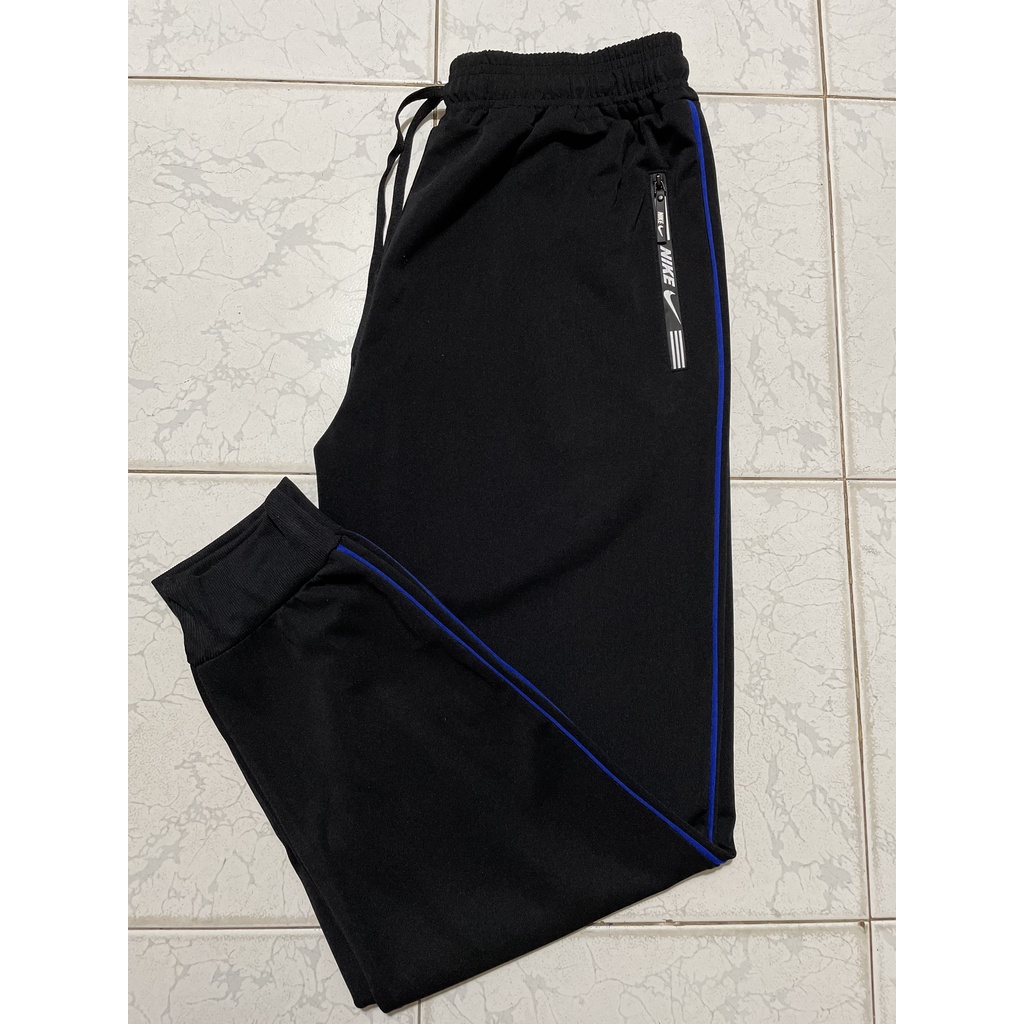 Quần thể thao Nam_Nữ có khóa kéo phối sọc UNISEX ống BO. Trẻ Trung Năng Động