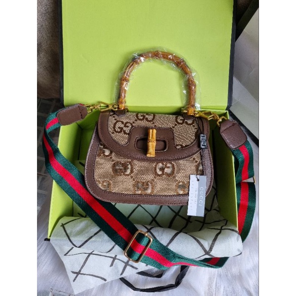 Túi gc quai gỗ logo GG to size22